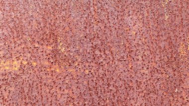 Paslı çelikten pürüzsüz bir yüzey. Arkaplan yapmak için uygun kaba, kahverengi bir dokusu var. Ve eski duvar kağıtlarının mesaj yazmak için bir alanı var..