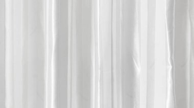 Perde dokusunun yüzeyinde gri-beyaz bir ton var. Duvar kağıdı veya arkaplan resmi için bunu kullanın. Metin için boş bir boşluk var.