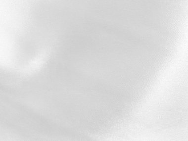 Eski beyaz kumaşın dokusu klasik bir donukluğa sahiptir, arka plan için klasik duvar kağıtları ve tasarımlar için kullanılan bir metin alanı vardır..