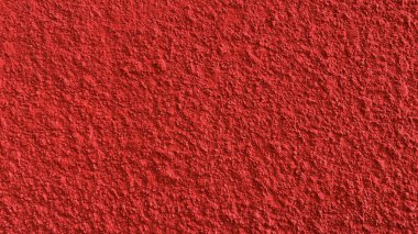 Kırmızı beton duvarın pürüzsüz dokusu kaba bir yüzey, metin ve arkaplan için alanı var..