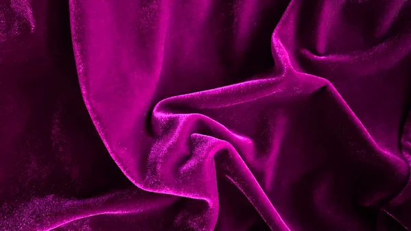背景には紫のマゼンタベルベット生地を使用 柔らかく滑らかな繊維素材の空の紫色の生地の背景 テキストのスペースがあります — ストック写真