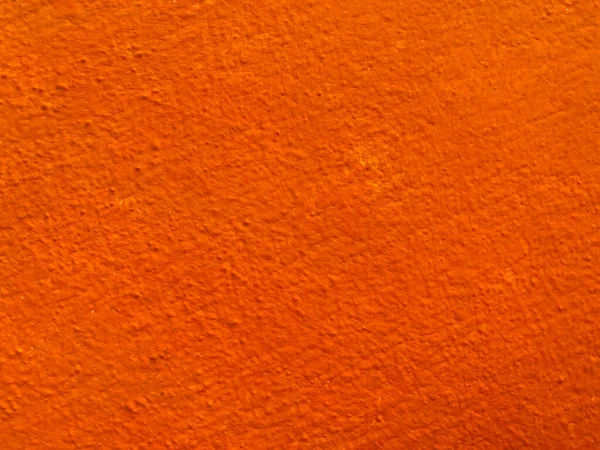 オレンジ色のセメントの壁の表面のシームレスなテクスチャ テキストのためのスペースと 背景のための — ストック写真