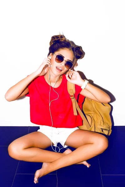 Elegant sexy woman with earphones — Stock Photo, Image