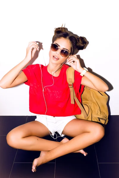 Elegant sexy woman with earphones — Stock Photo, Image