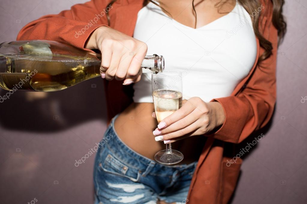 Young hipster girl with champagne