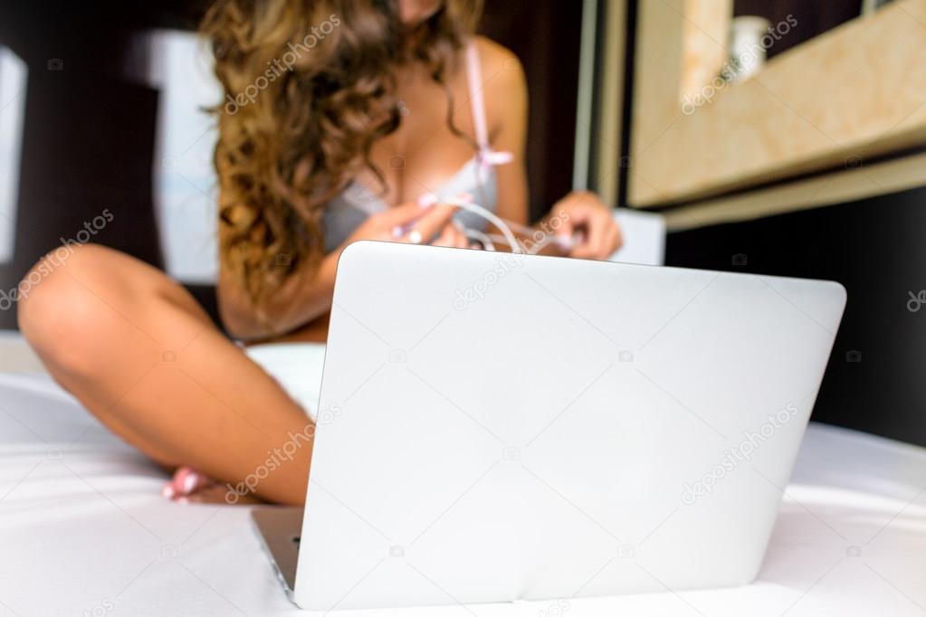 Sexy Woman working on a laptop