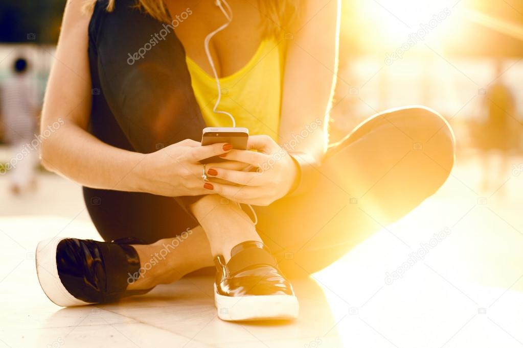 Brunette woman listening to music