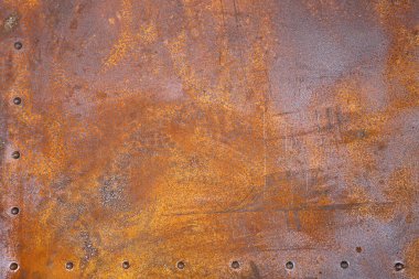 Paslı demir dokusu. Perçinli kırsal demir levha..