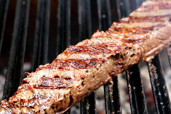 Fraldinha. Grilled BBQ Brazilian Steak Meat in Barbecue.