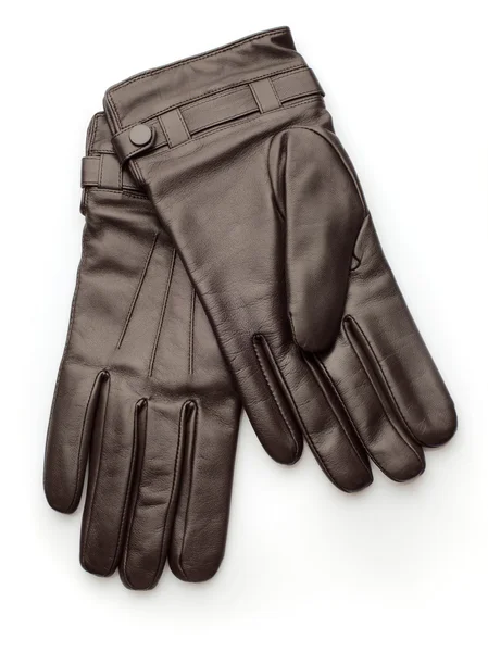 Dark brown leather gloves over white background — Stock Photo, Image
