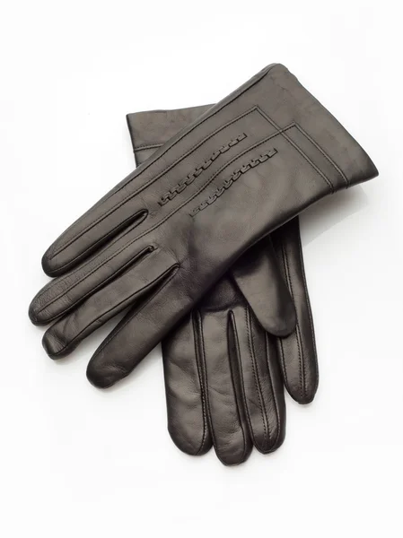 Black leather gloves over white background — Stock Photo, Image