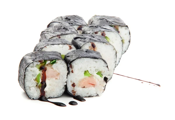 Sushiset med lax och avokado isolerad på vit botten — Stockfoto