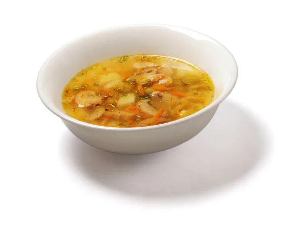 Soup with potatoes and mushrooms flavored with carrot, dill and pepper in white plate over white background — Stock Image Soup with potatoes and mushrooms flavored with carrot, dill and pepper in white plate over white background Royalty Free Stock Images
