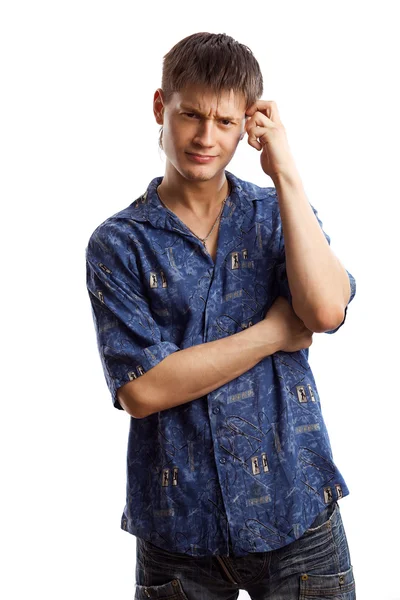 Thinking student in the blue shirt over white background — Stock Photo, Image