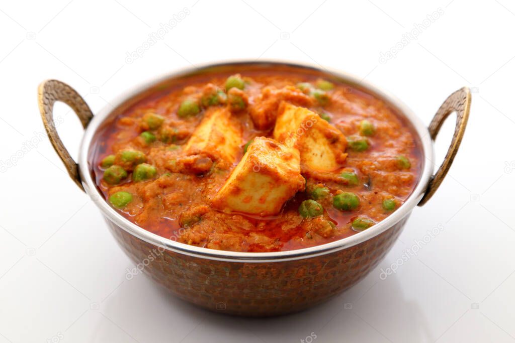 Mutter Paneer , Indian Dish Cottage cheese and Peas immersed in an Onion Tomato Gravy