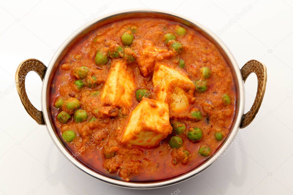 Mutter Paneer , Indian Dish Cottage cheese and Peas immersed in an Onion Tomato Gravy