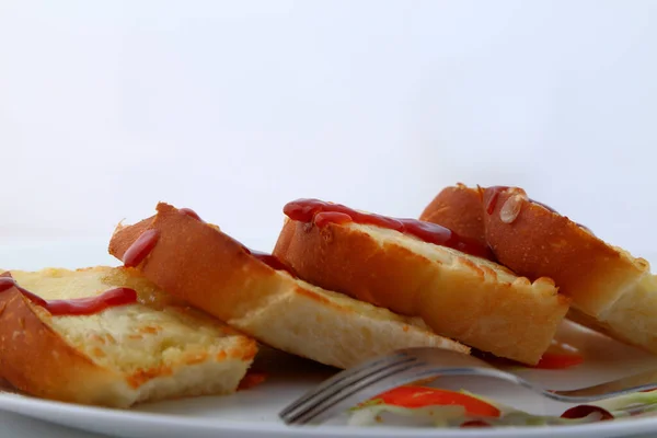 Garlic Herb Bread Slices Tomato Sauce White Plate — Stock Photo, Image