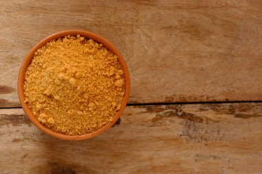 Esmer Şeker kasesi ahşap zemin üzerinde metin alanı ile