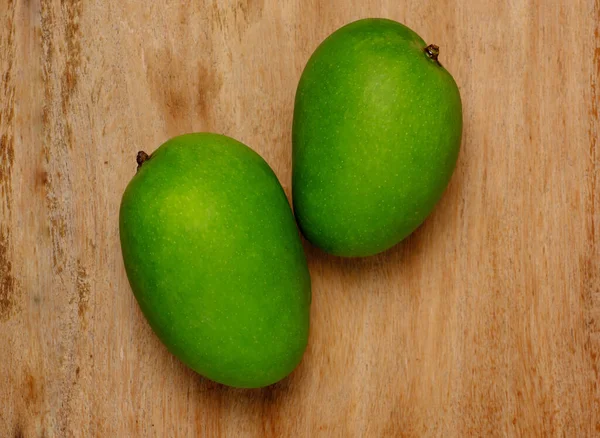 Two Fresh Green Raw Mangoes Wooden Background — Stock Photo, Image