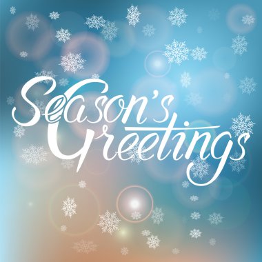 Sezon selamlar el yazısı metin arka plan bulanık üzerinde.