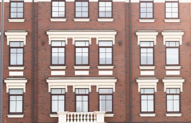 Town house in a flat style with square windows clipart