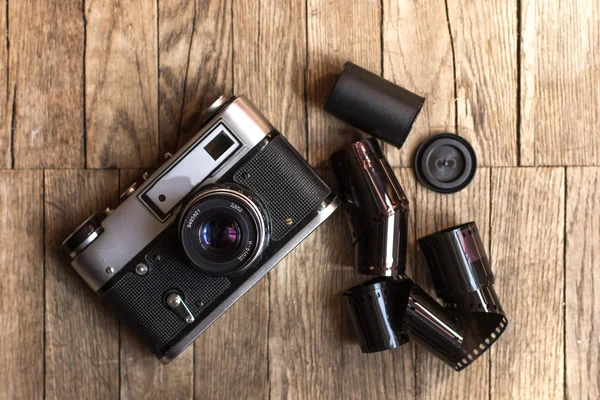 Camera on a wood background — Stock Photo, Image