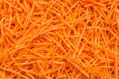 Rendelenmiş havuç. Taze organik doğranmış havuçlarla dolu.