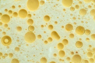 Arkaplan için portakal yağı baloncuklarının soyut makro fotoğrafı