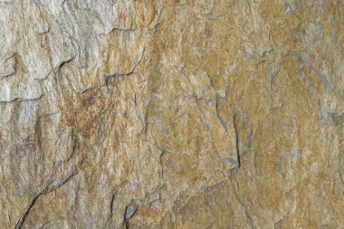 Arkaplan için tam kare pürüzlü ve paslı taş dokusu