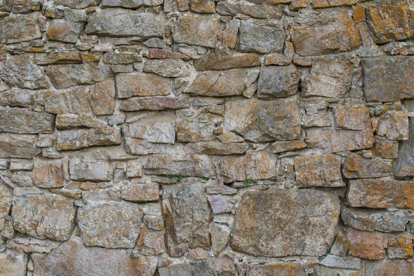 Masonry wall surface texture. Natural stone wall. Old stone blocks for background