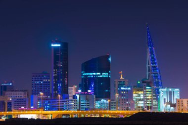 Night view of the buildings in Manama, Kingdom of Bahrain clipart