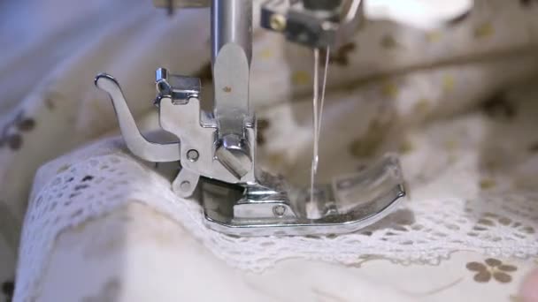 Close up on a sewing machine showing process — Stock Video