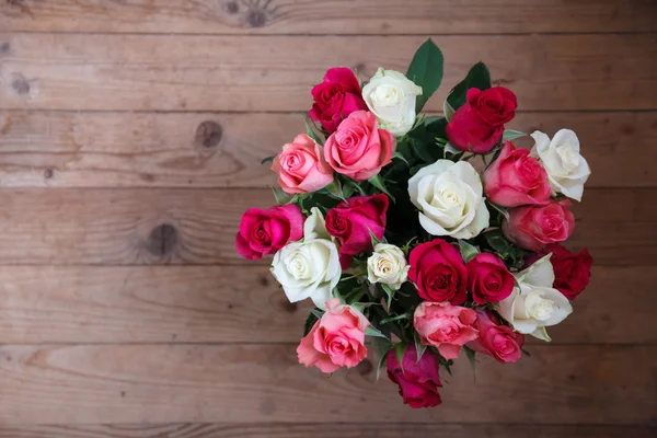Vase with flowers standing near the window — Stock Image Vase with flowers standing near the window Stock Picture