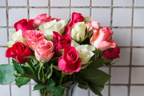 Vase with flowers standing near the window — Stock Image Vase with flowers standing near the window Royalty Free Stock Images