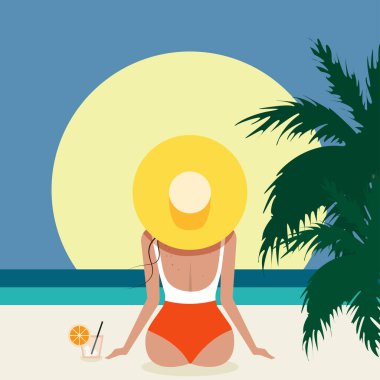 Sahilde bikinili bir kadın..