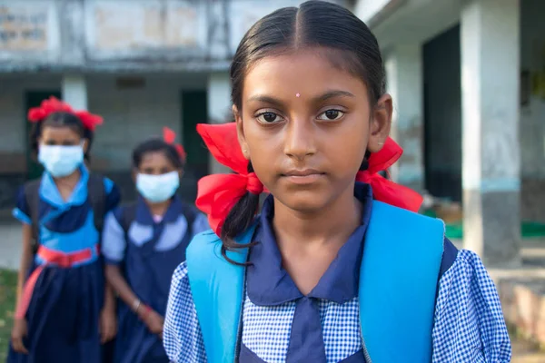 Three indian Rural School Girl Standing in school