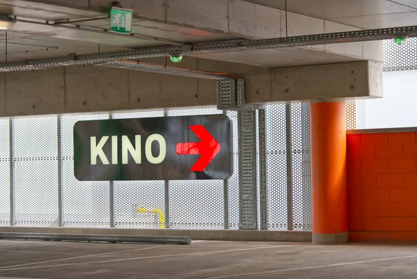 Cinema Sign in parking place in Estonian shopping center.