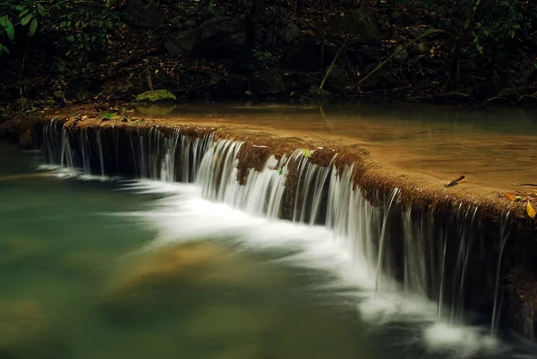 Waterfall with blue stream — Stock Photo, Image