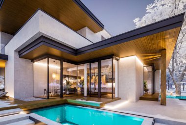 Otoparkı ve havuzu satılık ya da kiralık iki katlı evin beton cepheli ve arka planda güzel bir peyzajı var. Parlak beyaz karlı serin bir kış günü