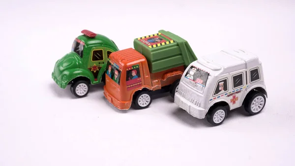 toy cars, police, trash truck and ambulance