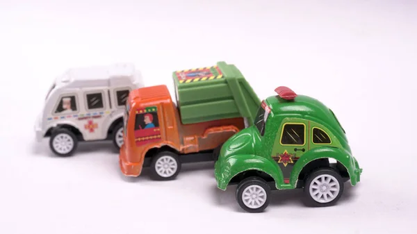 toy cars, police, trash truck and ambulance