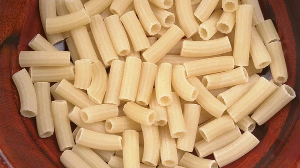 Raw Penne Pasta Bakgrund — Stockfoto