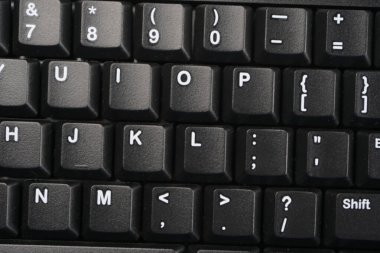 Modern bir dizüstü bilgisayarın klavyesini kapat, Üst Görünüm, metin için boşluk.