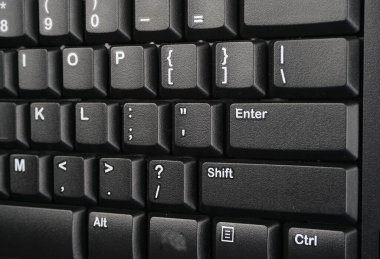 Modern bir dizüstü bilgisayarın klavyesini kapat, Üst Görünüm, metin için boşluk.