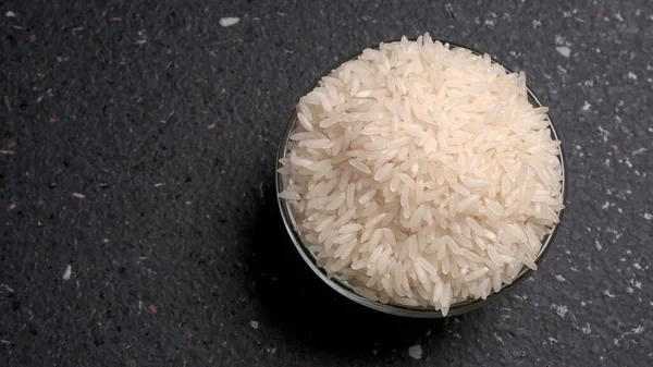 Nahaufnahme Von Weißem Reis Vor Grauem Hintergrund — Stockfoto