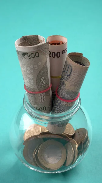 Jar of coins and money. Money saving financial concept, Money Growth.