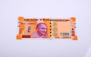 Yepyeni Hint para birimi banknotları, 200 rupi. Başarı ve işten kazanç sağlamak. Mal ve hizmetlere GST vergisi.