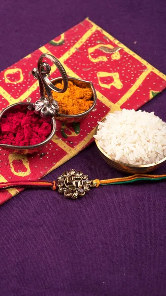 Indian Festival Raksha Bandhan Background Elegant Rakhi Rice Grains Kumkum — Stock Photo, Image