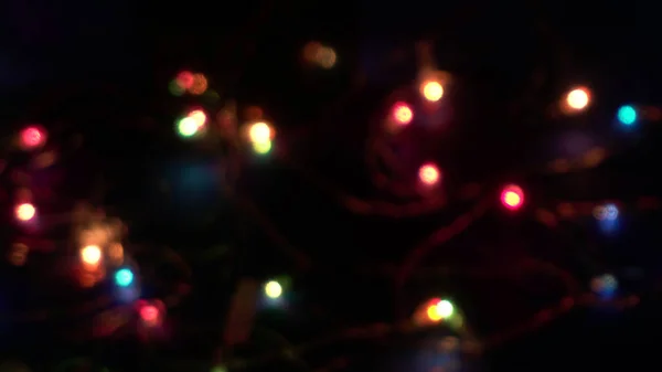 Niewyraźne Lampki Świąteczne Czarnym Tle Abstrakcyjne Tło — Zdjęcie stockowe