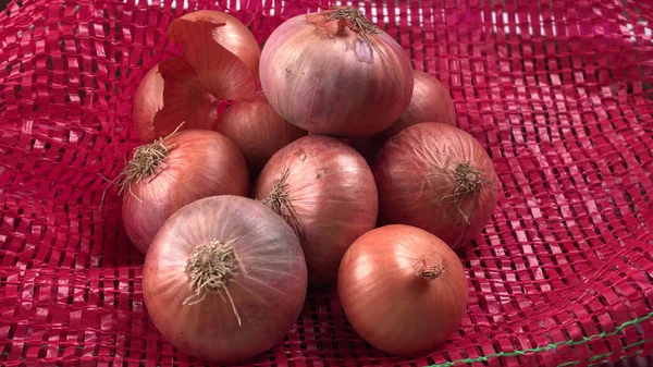 Closeup Shot Pile Red Onions Red Sack — Stock Photo, Image